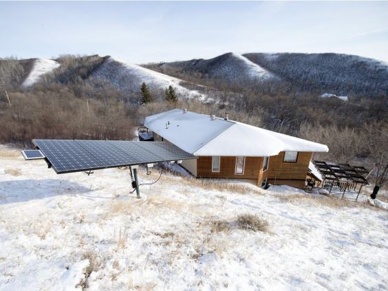 Jim Harding's house near Fort Qu'Appelle is powered by five solar panels and a 35-foot wind turbine. TROY FLEECE / Regina Leader-Post